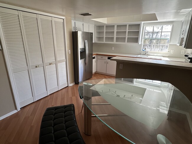 Kitchen with view of pantry doors. - 14448 Reuter Strasse Cir