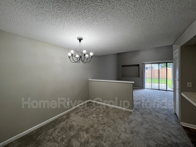 Building Photo - 8745 Whispering Pines Dr