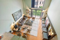 Building Photo - 1 br, 1.5 bath Condo - 101 N Clematis St A...