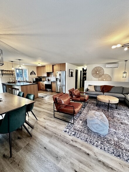 Main level living, kitchen, dining - 128 Mallard Loop