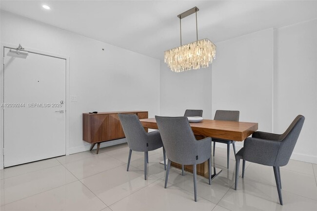 Building Photo - 10275 Collins Ave
