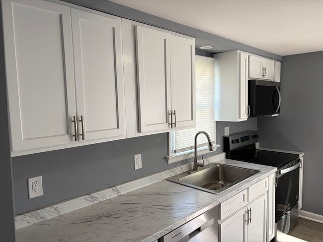 Building Photo - Fully Renovated 2BR/1.5BA Twin Home on Corner Lot-Move in Ready