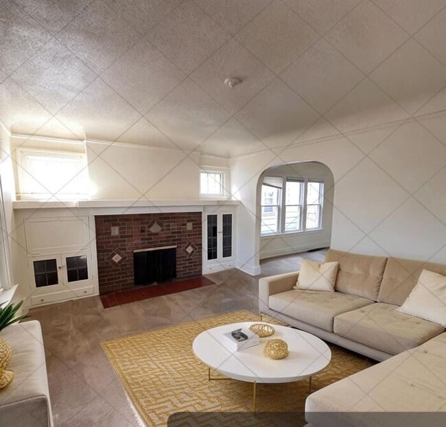 Building Photo - Cozy and Bright 2-Bedroom Duplex with Fire...