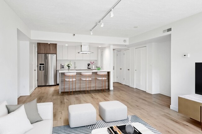 Building Photo - 2BR Condo w/ Covered Parking and Balcony Views at Broadway Towers