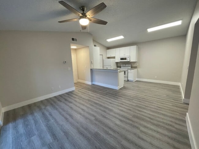 Building Photo - ANNUAL RENTAL - OASIS- 1 BED/1BATH