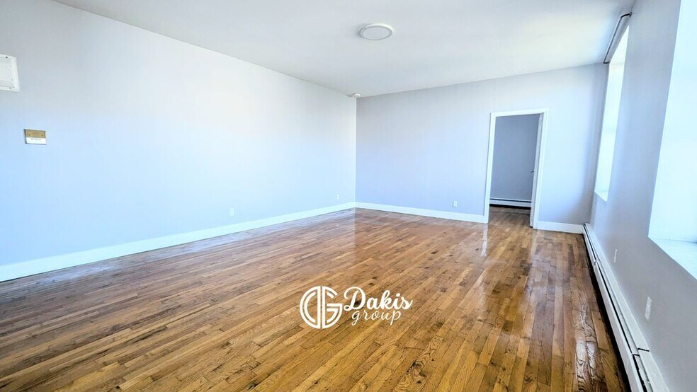 Building Photo - 23-34 28th Avenue, 1