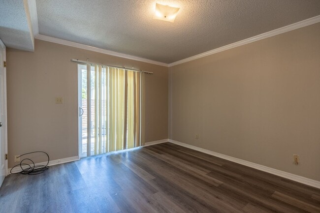 Building Photo - ONE FREE MONTH ON 13 MONTH LEASE! Welcome to this charming 3-bedroom, 2-bath condo located in the...