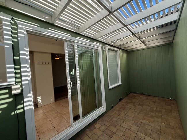 Building Photo - Hard floors, extra closets, patios & fence...