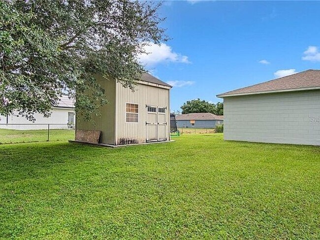 Building Photo - SINGLE FAMILY HOME IN POINCIANA 3/2