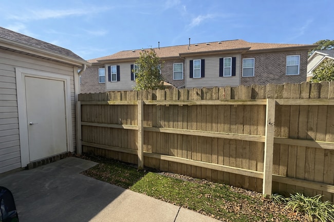 Building Photo - Spacious End-Unit Condo with Dual Primary Suites & Bonus Room