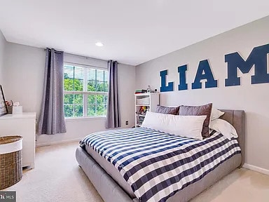Building Photo - A stunning end-unit carriage home with an ...