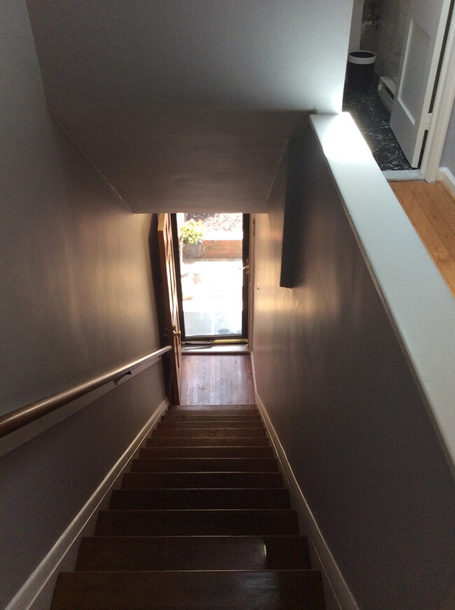 Stairs up to 2nd floor apartment - 230 Varnum St NE