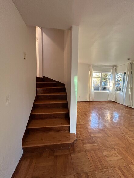 Stairs lead up to bedroom and bathroom. - 1903 Sacramento St