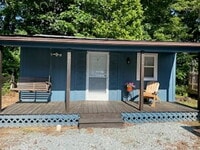 Building Photo - Fully furnished. Utilities included.