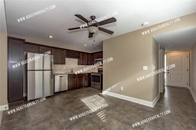 Building Photo - 8318 N Spruce Ave