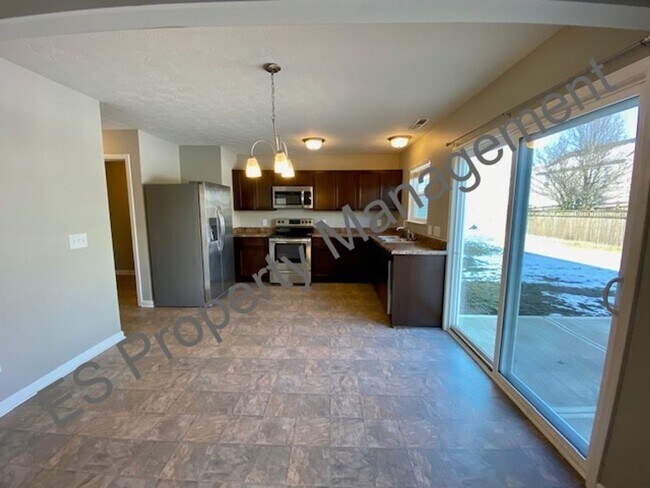 Building Photo - Beautiful 4 bedroom, 2.5 bathroom home in Ingalls- Prairie Hollow Community