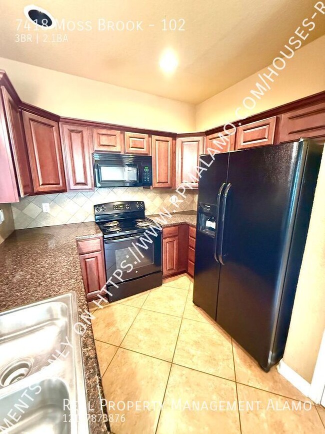 Building Photo - 7418 Moss Brook Dr