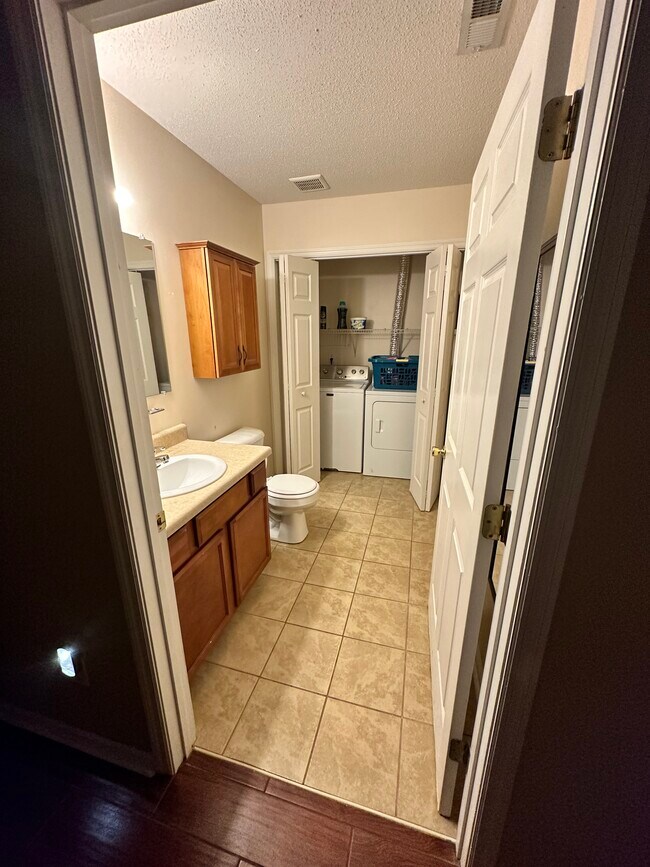 downstairs laundry room and half bath - 178 Kelly Cir