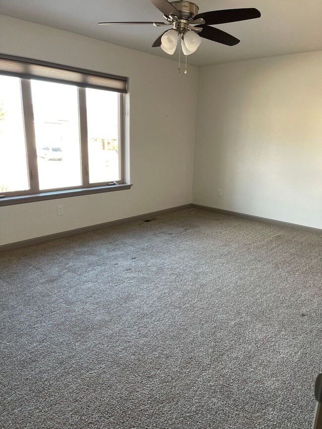 Building Photo - 3 Bedroom 2 Bath With a 2 car garage