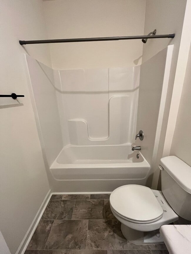 Building Photo - HALF-PRICE RENT for Your First Month: Move...
