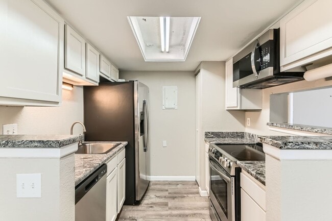 Building Photo - Application fee waived! Sleek 1 bedroom wi...