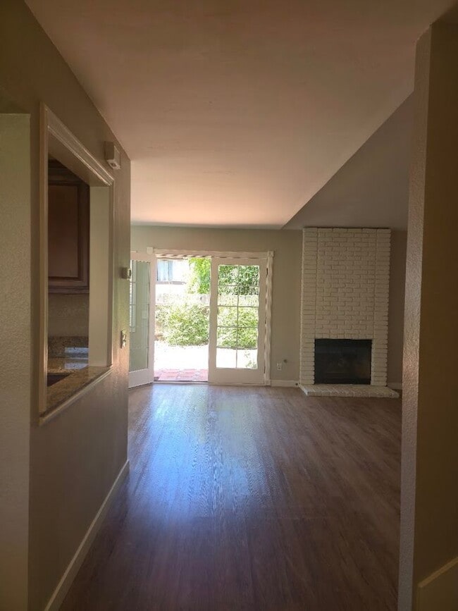 Building Photo - Light-Filled End Unit Condo, 2BD/2.5BA wit...
