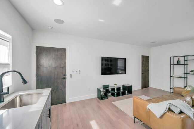 Building Photo - Luxury Living in Grand Central District: Exquisite Furnished Home with Pool