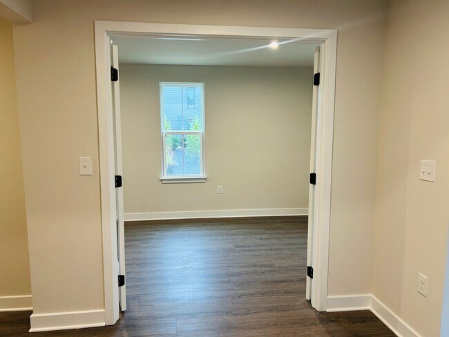 Building Photo - New Construction • 4 BR • 2 Full / 2 Half BA • End Unit Townhome in Village Town – Fayetteville’s...