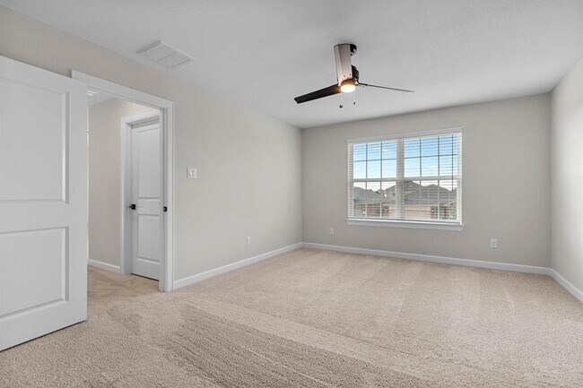 Building Photo - 1006 Whispering Winds Dr
