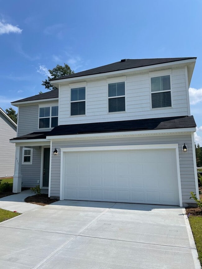 Building Photo - THE COMMONS AT RICHMOND HILL **Rent Specia...