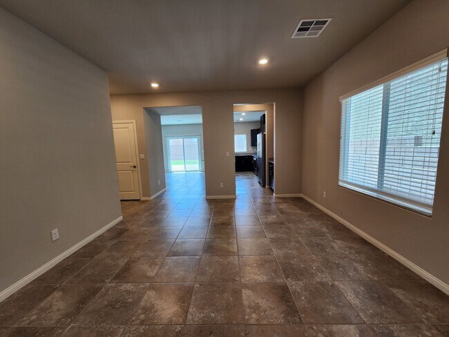 Building Photo - A Fairly New Home with 5 Bedrooms in a gated community