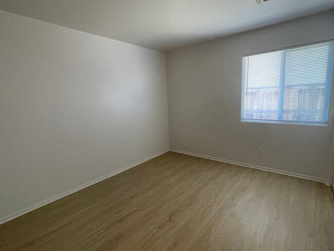 Building Photo - Adelanto Home-3 Bedrooms,2 Bathrooms, Laminate Floors, Indoor Laundry Room, Large Back Yard