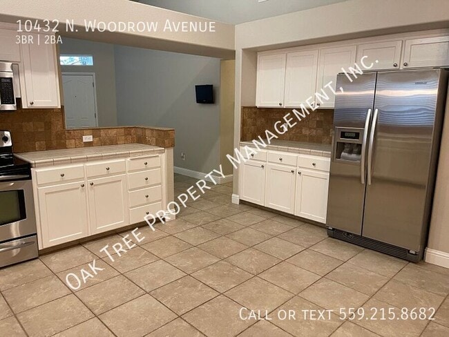 Building Photo - 10432 N Woodrow Ave