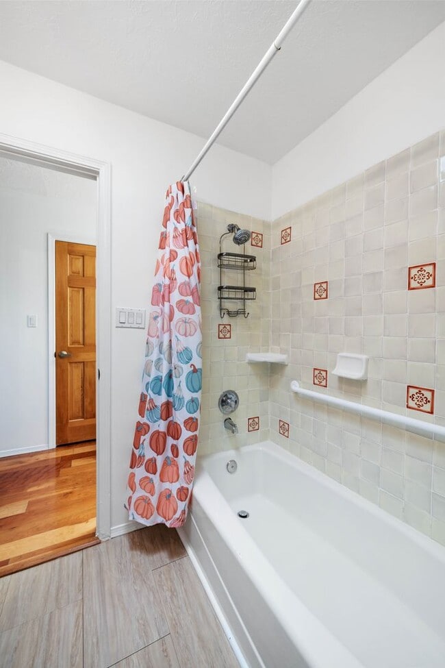 Building Photo - NEW MOVE-IN SPECIAL! Vibrant Home Off Rode...