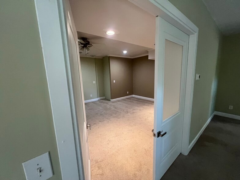 Huge primary bedroom with glasses double-doors. - 3734 Looper Rdg