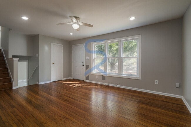 Building Photo - Move in before December 15th and choose your reward: a $250 Amazon Gift Card or a 55" Smart TV!