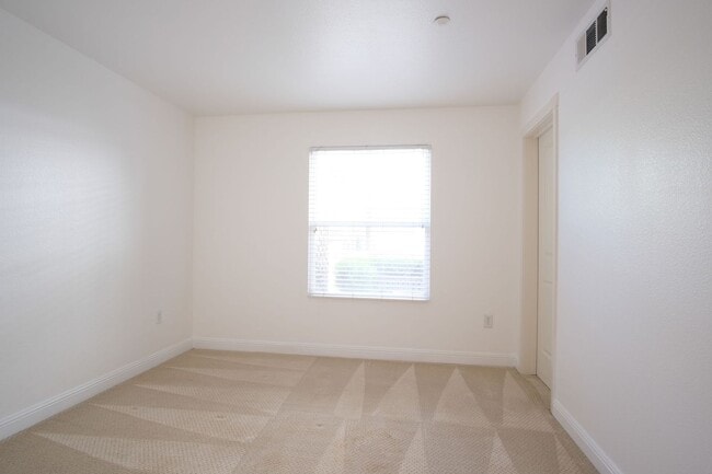 Building Photo - NOW AVAILABLE- NEW PRICE! Spacious 3-Bed, ...