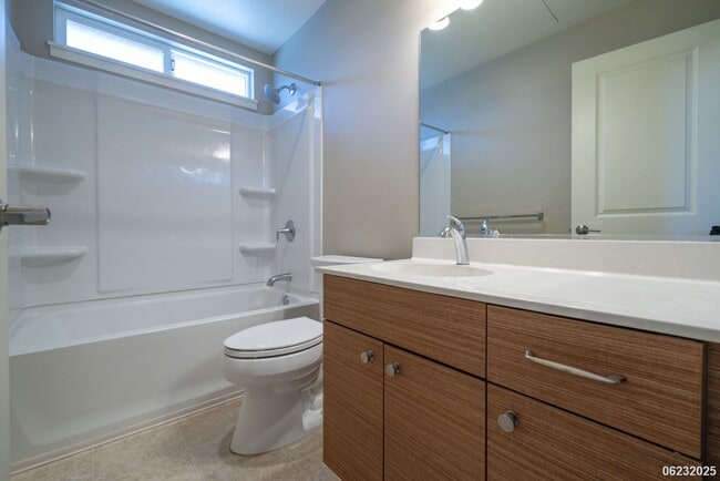 Building Photo - Available now!  Updated 4-bedroom, 2.5-bat...