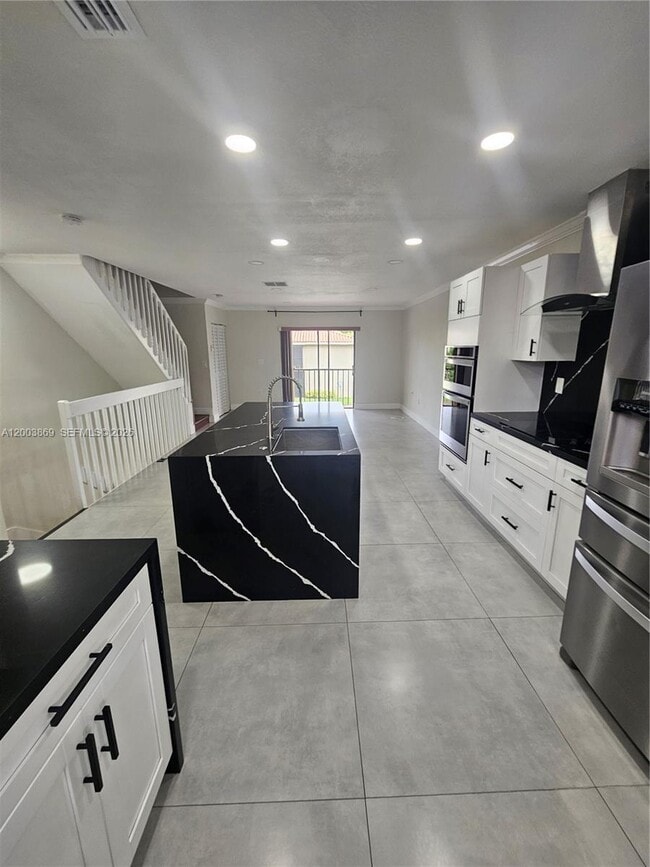 Building Photo - 9846 Hammocks Blvd