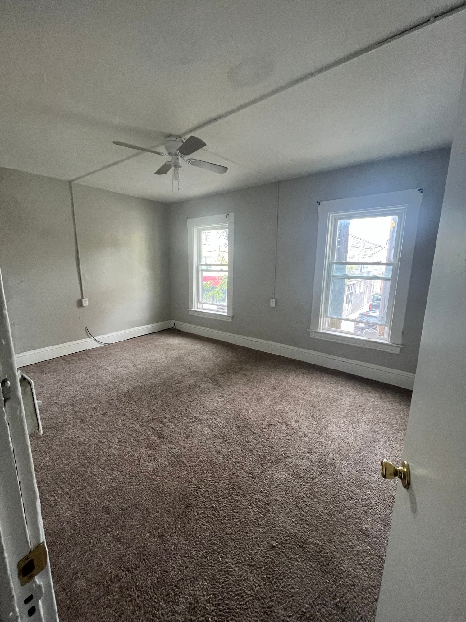 Another bedroom or a living room with great natural light! - 2004 E 125th St