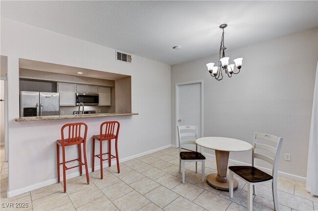 Building Photo - 6650 W Warm Springs Rd