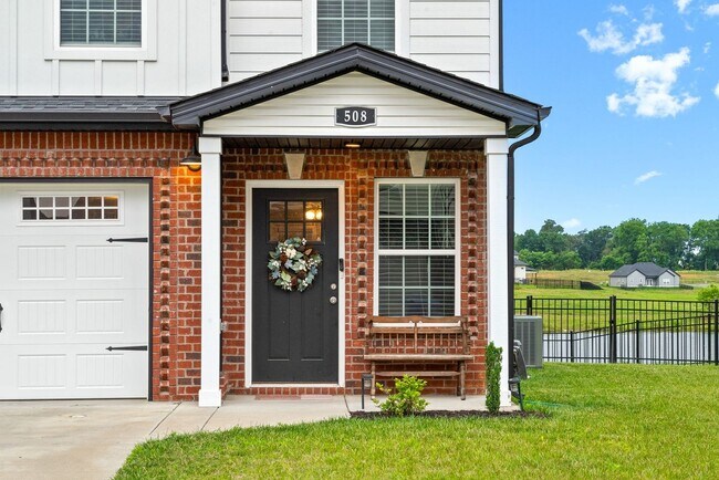 Building Photo - Stocked Pond, Walking Trails and More!!