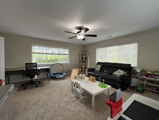 Building Photo - Elegant 5BR + Bonus Room Home with Bay Windows, Entertainment Room & Oversized Primary Retreat