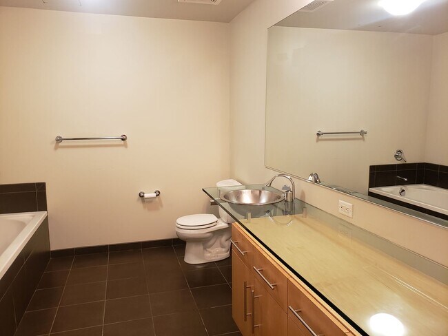 Building Photo - Wonderful Two story Penthouse Condo! Water...