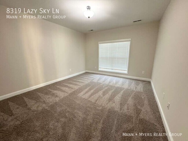 Building Photo - 8319 Lazy Sky Ln