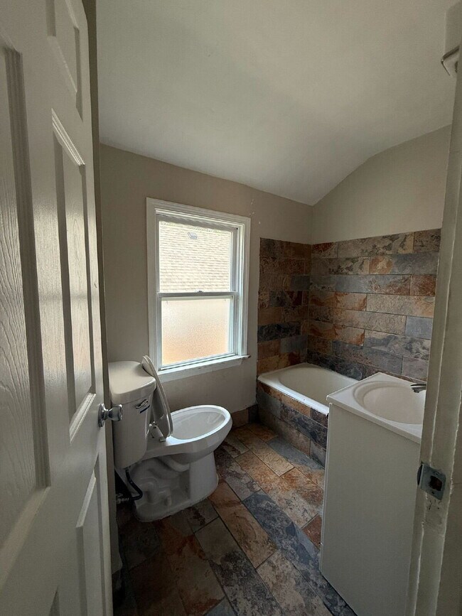 Building Photo - Find Comfort in Every Corner at Woodmont Avenue