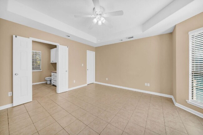Building Photo - Live just steps from Lake Conroe in this beautifully maintained 3-bedroom, 2-bath home located in...