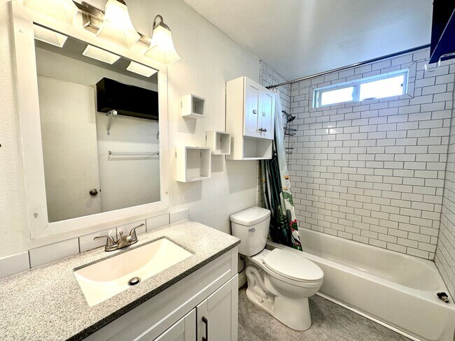 Building Photo - Three bedroom home with large fenced yard