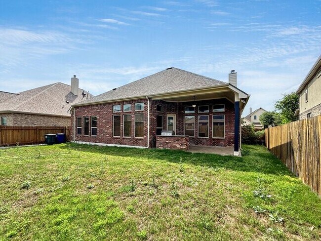 Building Photo - Spacious & Stylish 4-Bedroom Home with Mod...