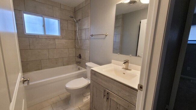 Building Photo - NE 3 bedroom updated with appliances and garage